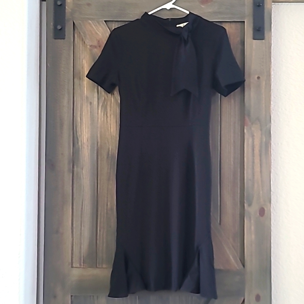 Aisize vintage redefined black dress new with tags.